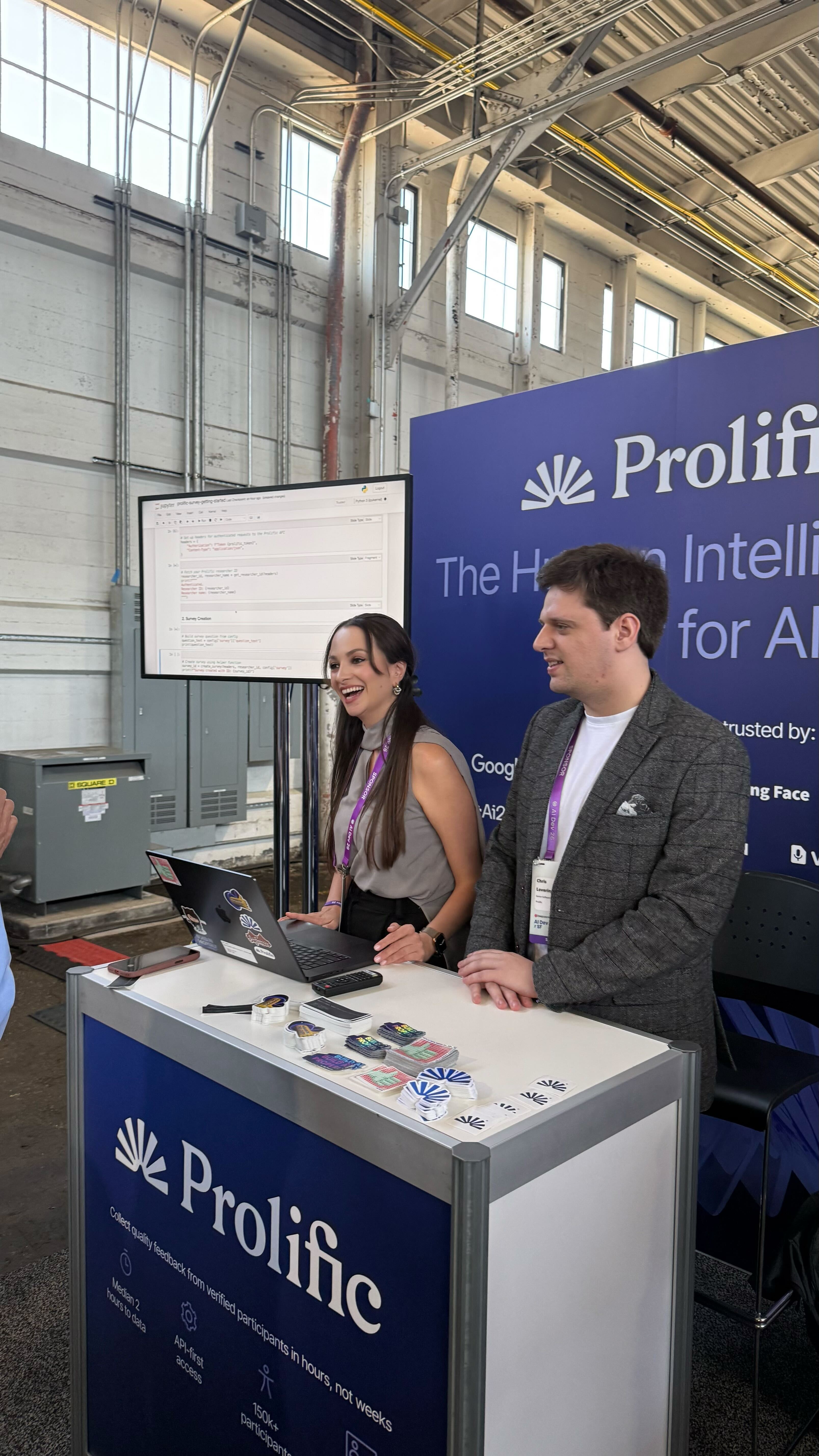 Viviana Marquez giving a Prolific AI conference booth demo