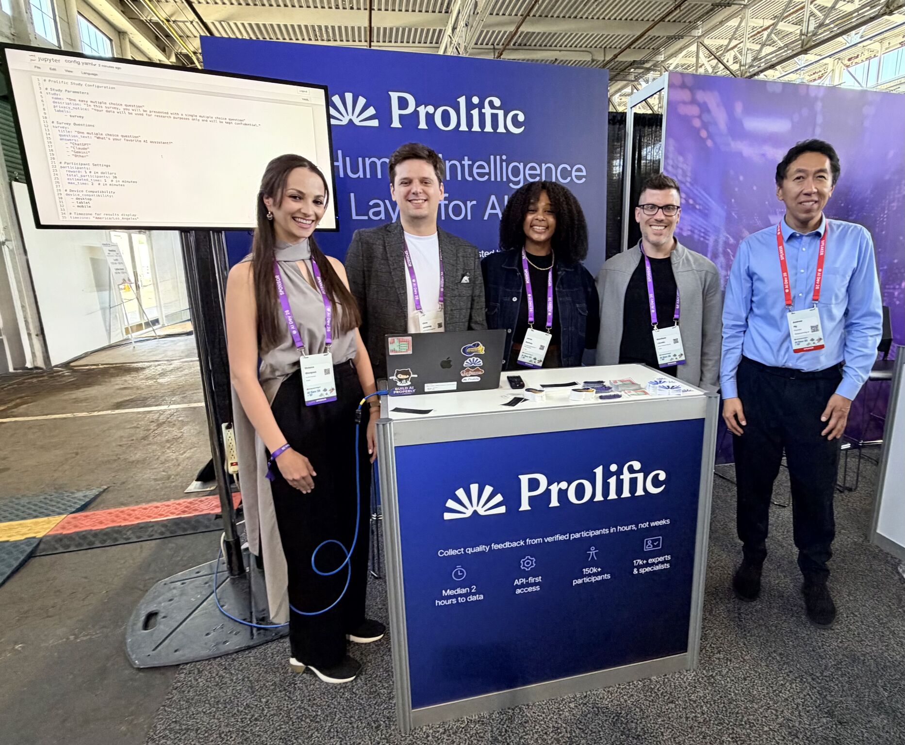 Viviana Marquez with Prolific booth team at AI conference