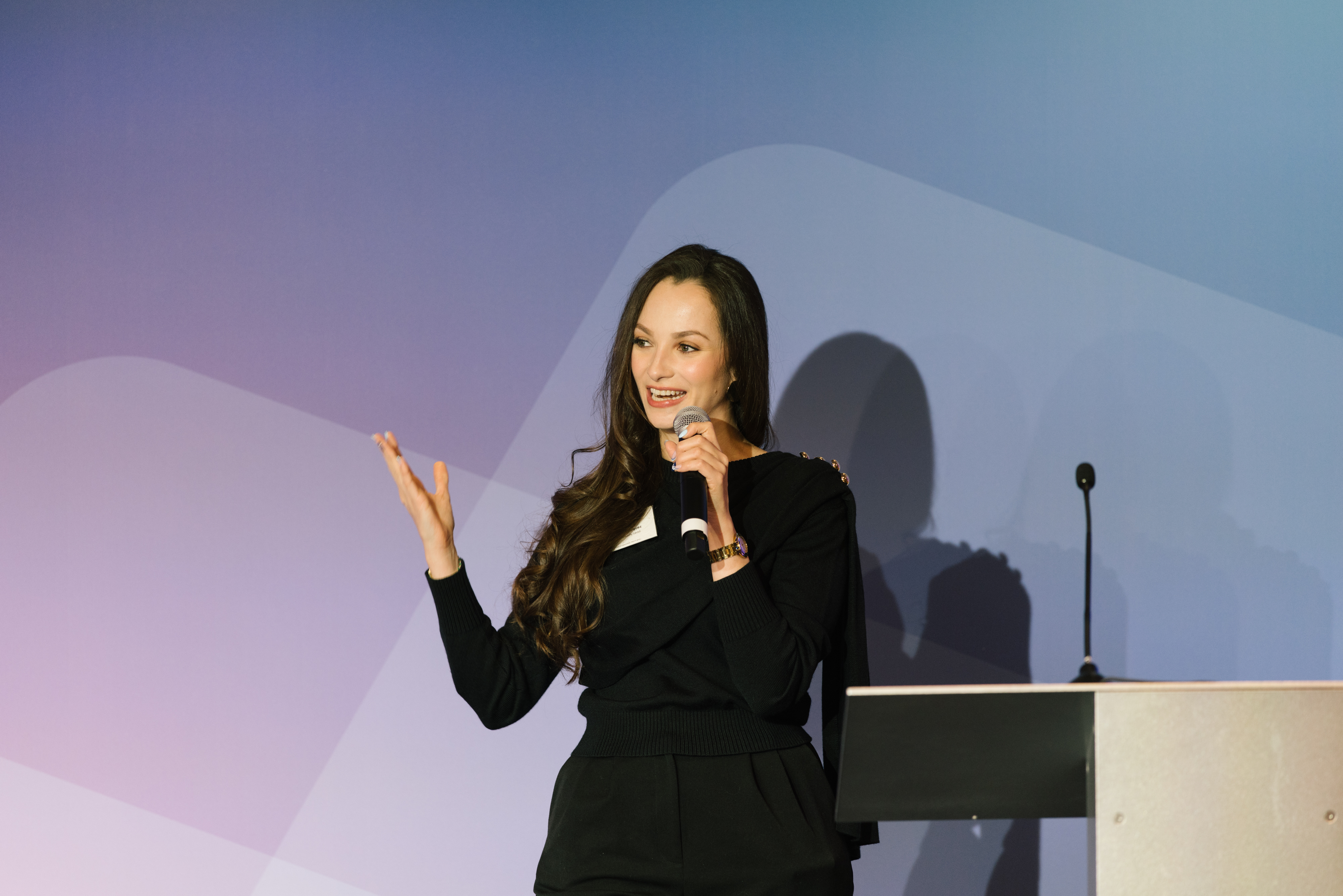 Viviana Marquez speaking onstage at Prolific